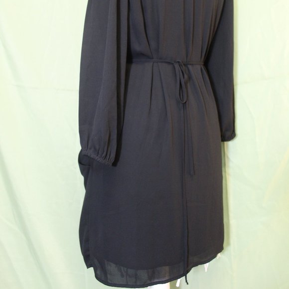 Flattering Black Baby Doll Dress - Picture 6 of 14